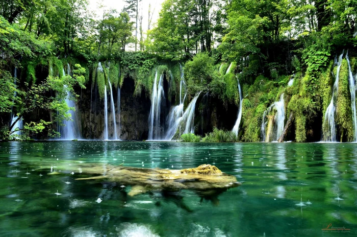 waterfalls in forest Plitvice Lakes National Park Entrance 2k