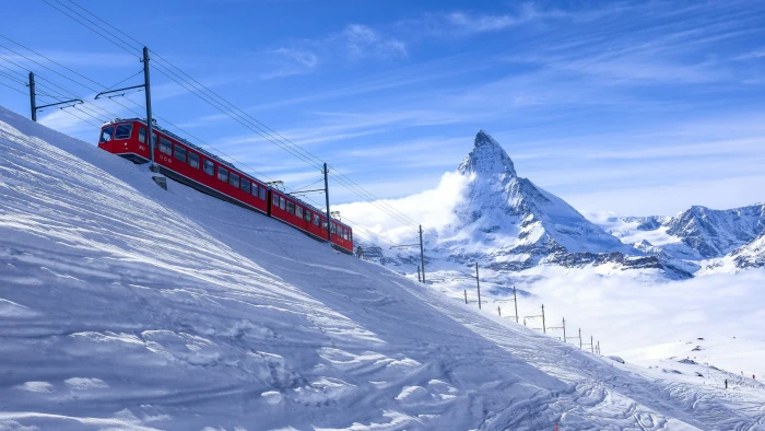 red and black train white mountains at daytime 2k 4k