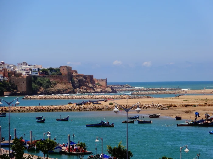 boats on body of water under blue sky during daytime morocco 2k