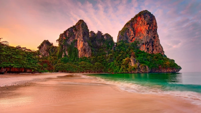 railay beach promontory coast sky krabi tropics cliff 2k 4k