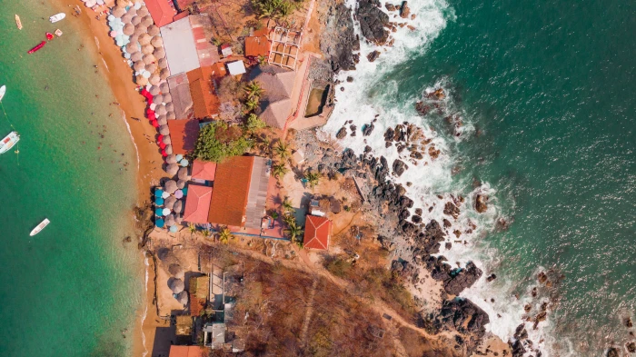 aerial photo of houses in rocky beach nature outdoors landscape 2k 4k