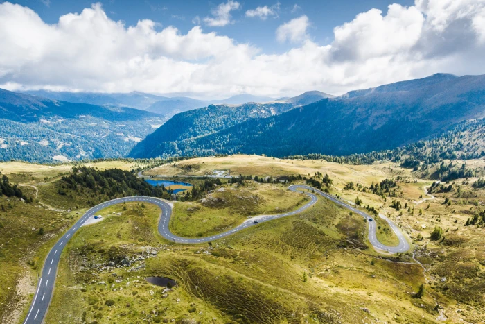 Curvy Alpine Road from Above aerial view alpine roads 2k 4k