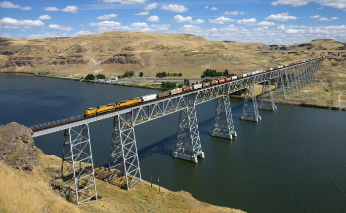 yellow white and black train nature landscape water bridge 2k 4k