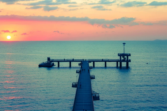 brown wooden dock on body of water during golden hour burgas 2k 4k 5k