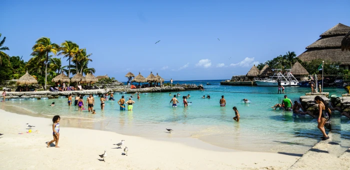 photo of group people in the beach xcaret cancun mexico 2k 4k 5k