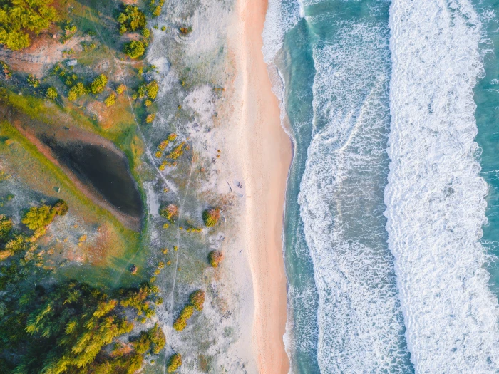 aerial photo of body water during daytime photography beach 2k 4k