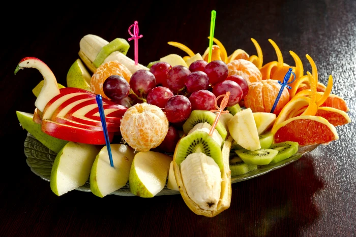 variety of slice fruit on plate food black background dessert 2k 4k 5k