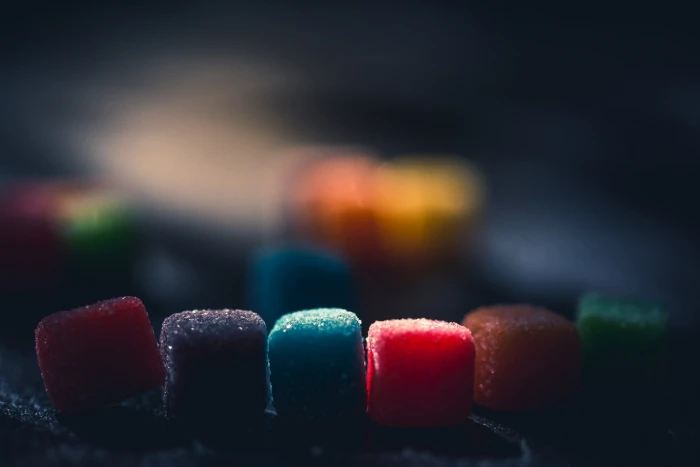 assorted color candies dark colorful sweets food macro medicine 2k