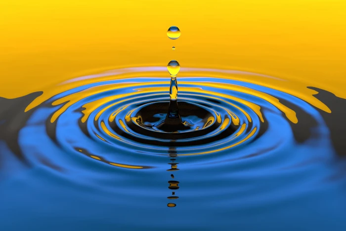 Water droplet splash in yellow and blue nature abstract calm 2k