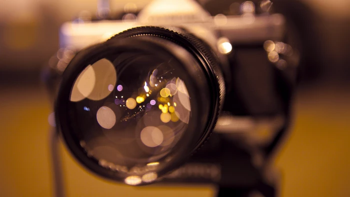 black SLR camera macro bokeh lens blurred close up optical instrument 2k