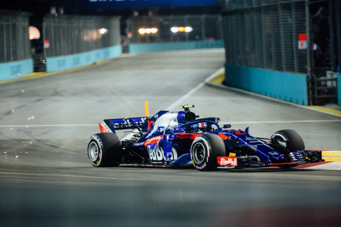 blue red and white formula 1 on race track car one 2k 4k 5k