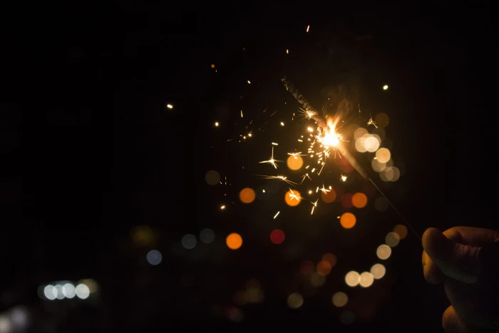 bokeh light photo photography of sparkler hand holding 2k 4k 5k