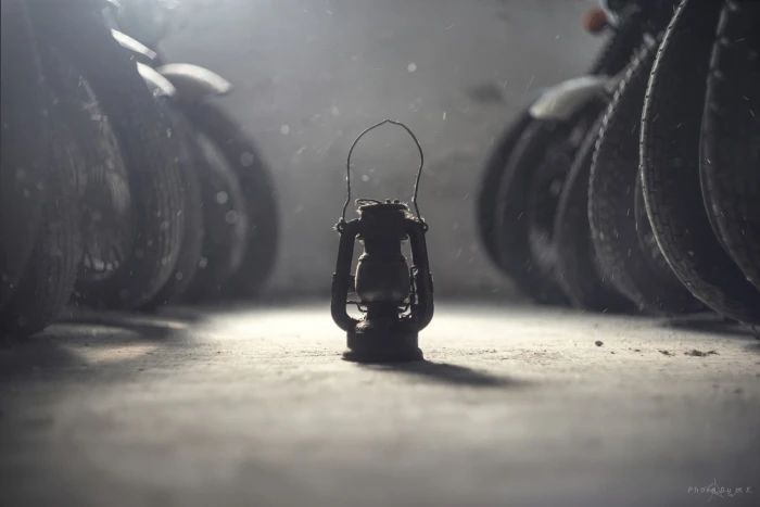 brown metal lantern black kerosene lamp photography tyres depth of field 2k