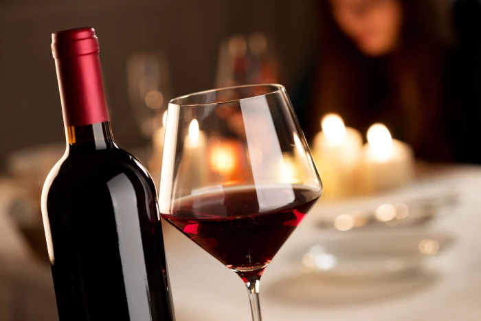 glass wine bottle table red candles bokeh drink alcohol 2k 4k 5k