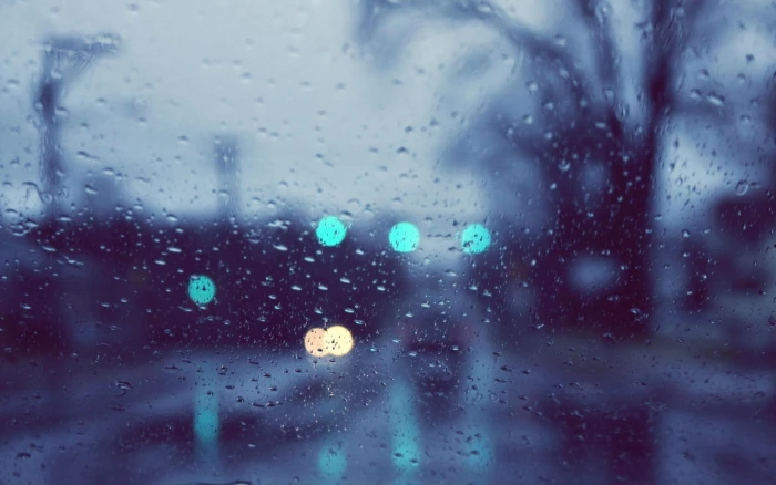 light bokeh urban water on glass rain raindrop window weather 2k