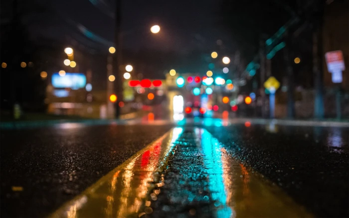 Road asphalt rain Night lights street bokeh close up 2k