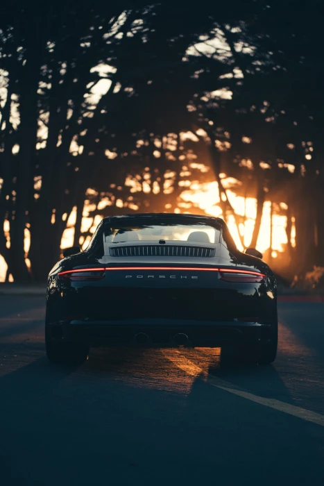 sunset Porsche car sunlight road trees photography bokeh 2k