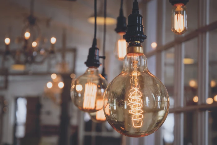 turned on bulbs light filament element electricity globe 2k