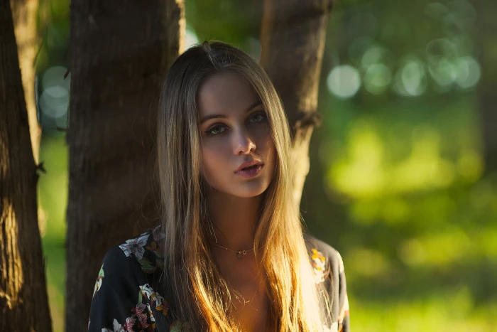 women s black floral top blonde sand trees bokeh portrait 2k