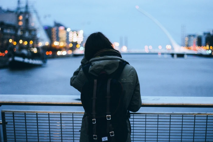 women s black leather coat and backpack person wearing gray jacket 2k