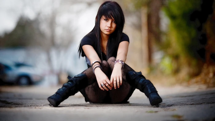 women s black t shirt and pants depth of field urban sitting 2k