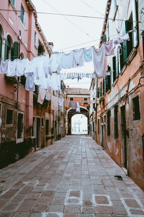multicolored hanged clothes clothesline clothing towels building 2k 4k