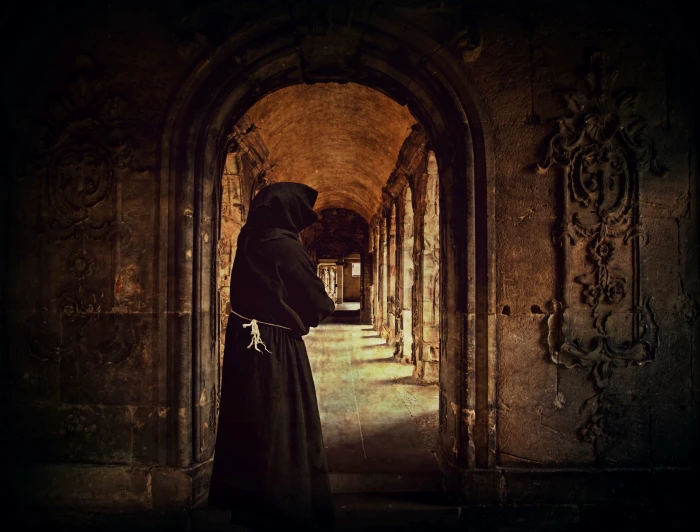 person wearing black hoodie top photo monk man monastery archway 2k