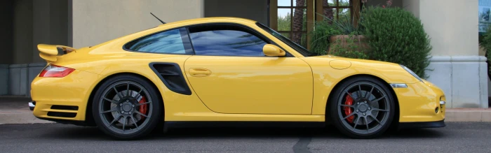 yellow sports coupe car Porsche Turbo multiple display widescreen dualmonitor dualscreen 2k 4k