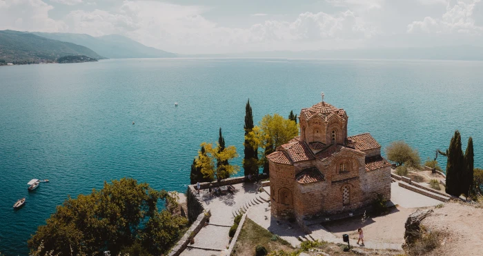 brown house beside sea ohrid building castle architecture 2k 4k 5k