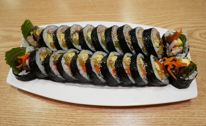 sushi rolls in white plate on brown table food kim rice lol 2k 4k 5k