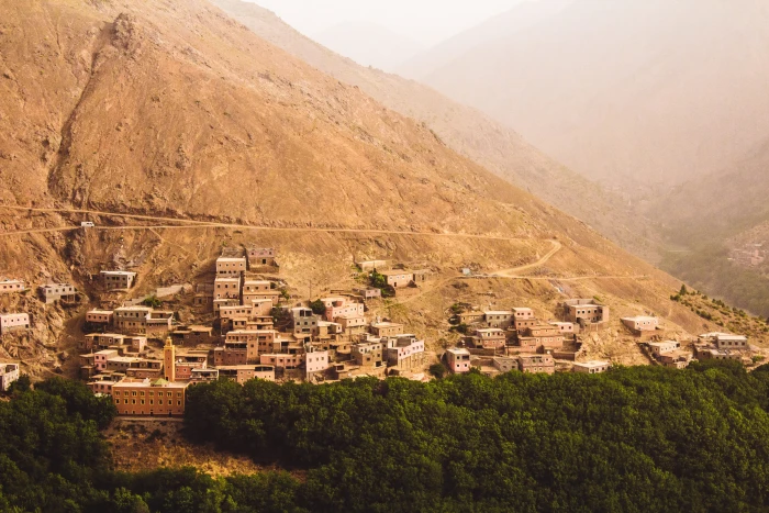 photo of brown houses surrounded by green trees mountain marrakesh 2k 4k 5k