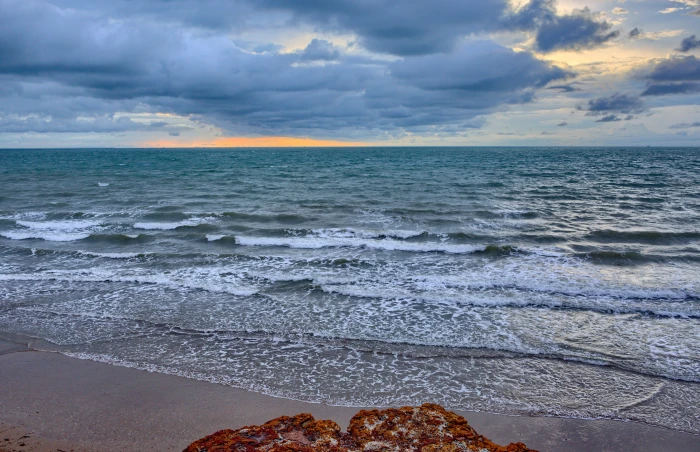ocean waves hammering seashore under gray cloudy sky beach nature 2k 4k 5k