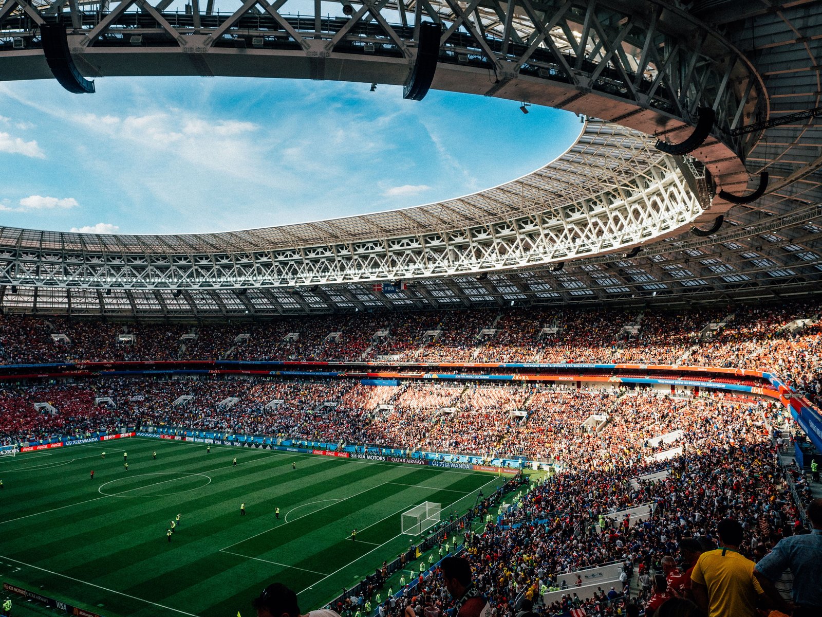 football stadium surrounded by people under cloudy sky crowd 67 2k 4k