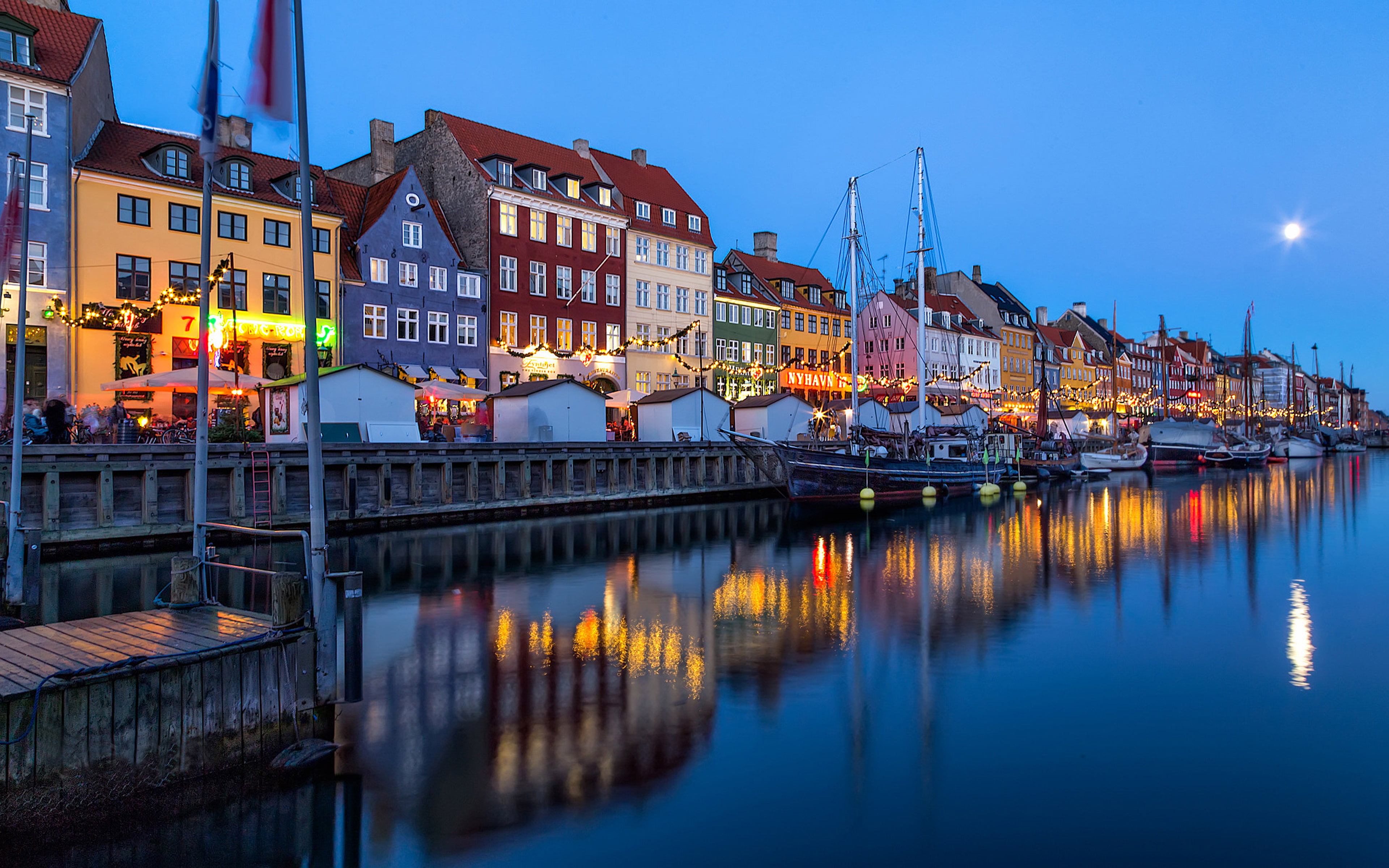 Nyhavn District On Shore Channel And Entertainment In Copenhagen Denmark Christmas Market Lights Boats Reflection The Water Wallpaper Hd 2k