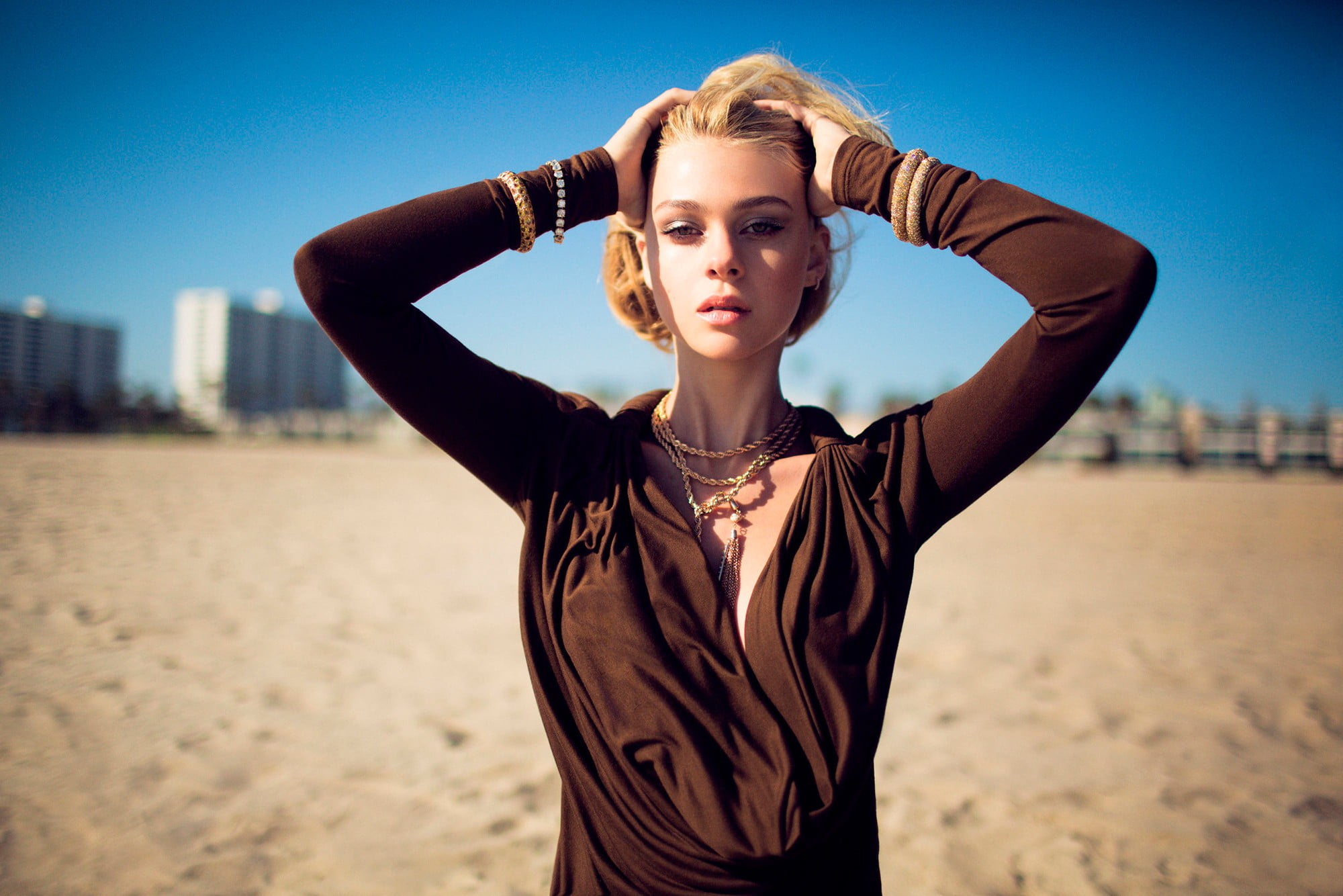 Nicola Peltz actress celebrity hands on head women outdoors 2k