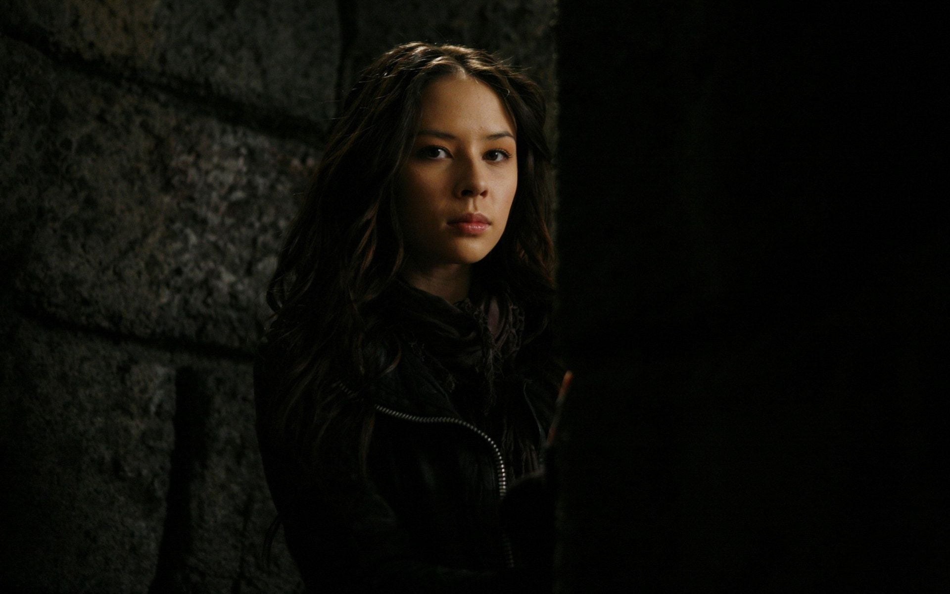 women's black top malese jow actress face dark portrait