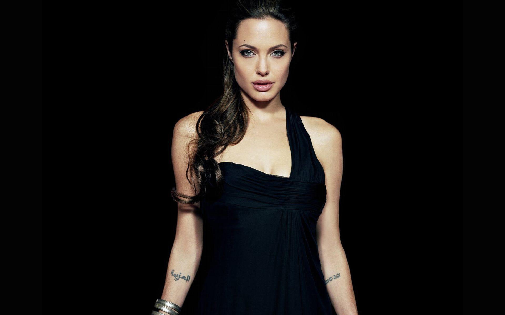 Angelina Jolie Actresses one person portrait black background