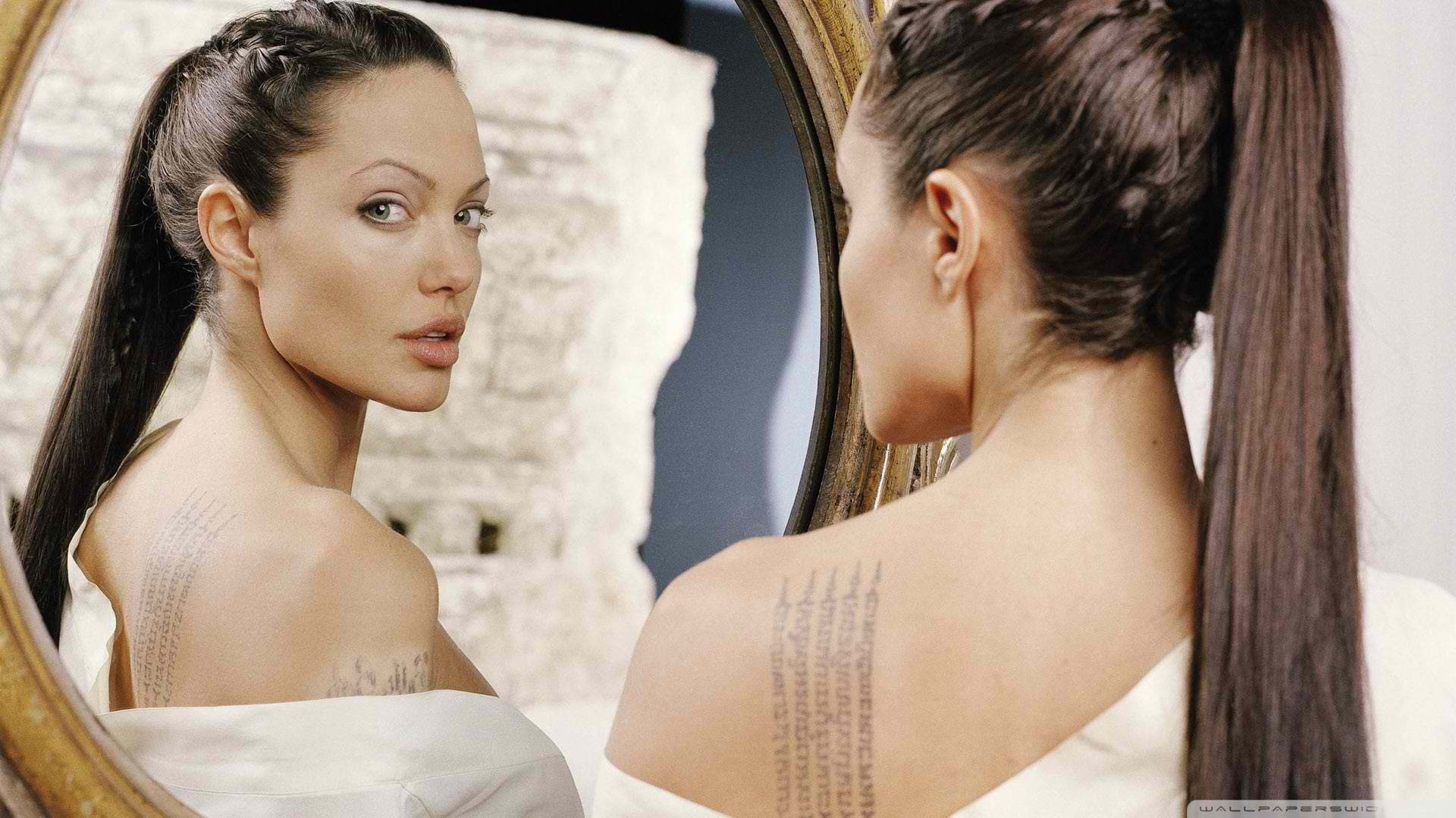 Angelina Jolie mirror face women actress tattoo young adult