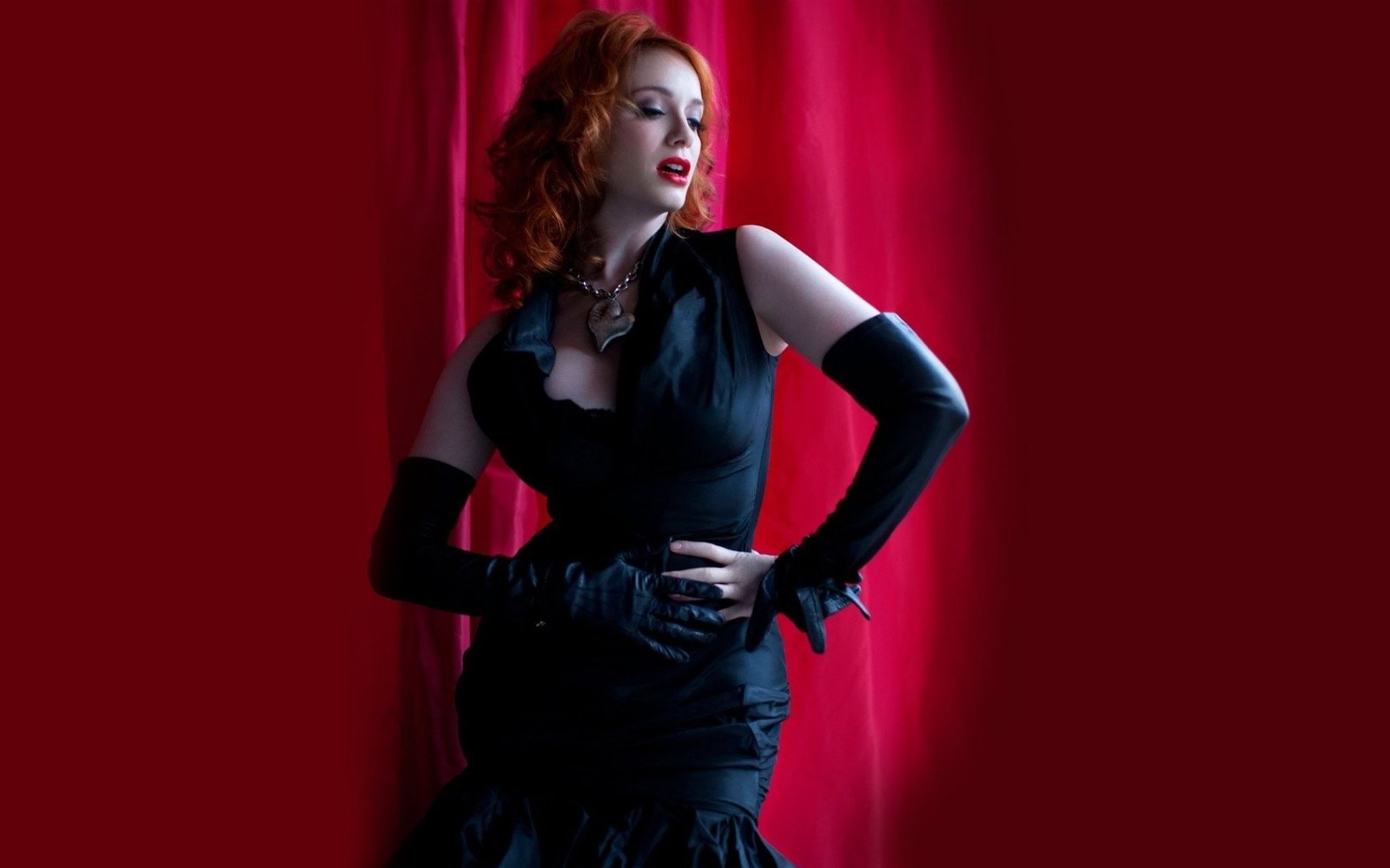 Christina Hendricks redhead dress actress red background