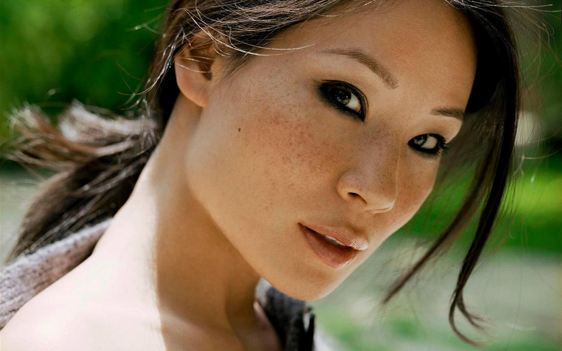 women's blonde hair face freckles Lucy Liu Asian brunette