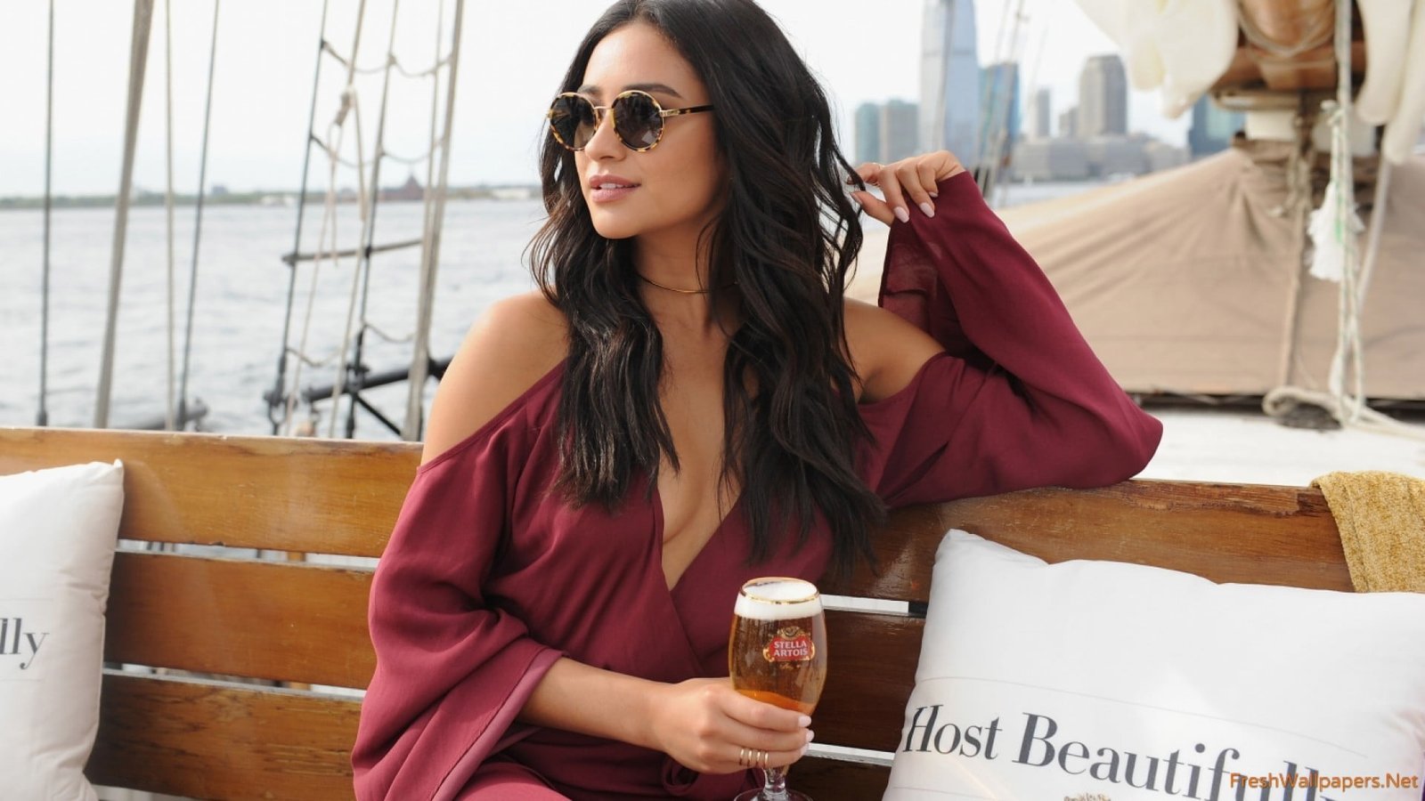 women's maroon long sleeved top actress brunette hair