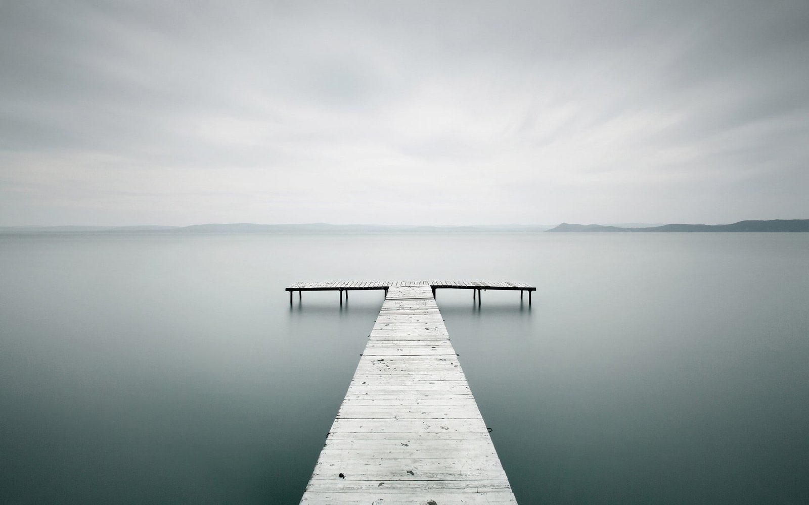 brown wooden dock during daytime in nature photography landscape 2k