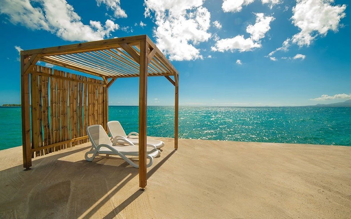 two white wooden lounge chairs summer sea Caribbean nature