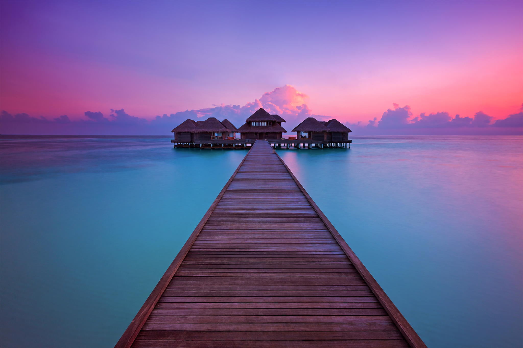 brown dock sunset the ocean pierce resort Bungalow Maldives 2k