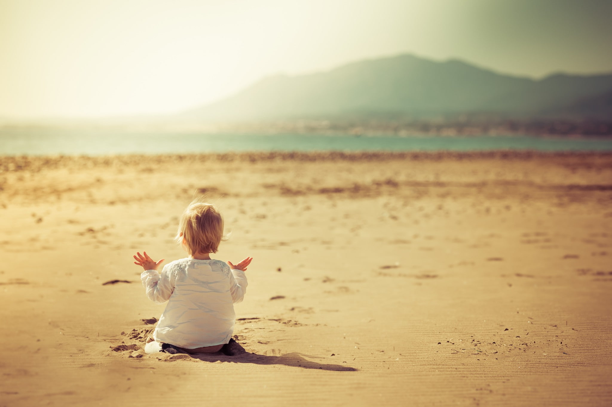 children baby beach sand sitting rear view one person 2k