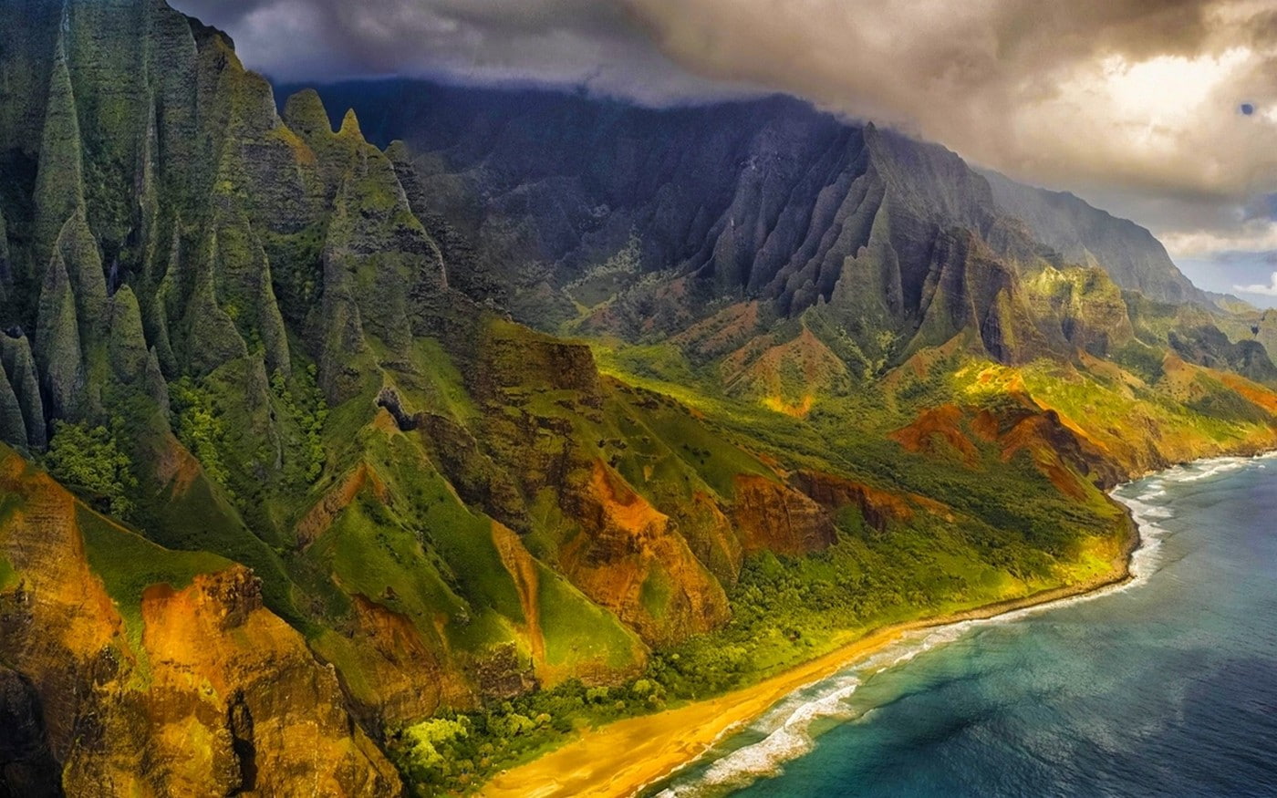 Aerial View beach cliff clouds Coast Hawaii island Kauai