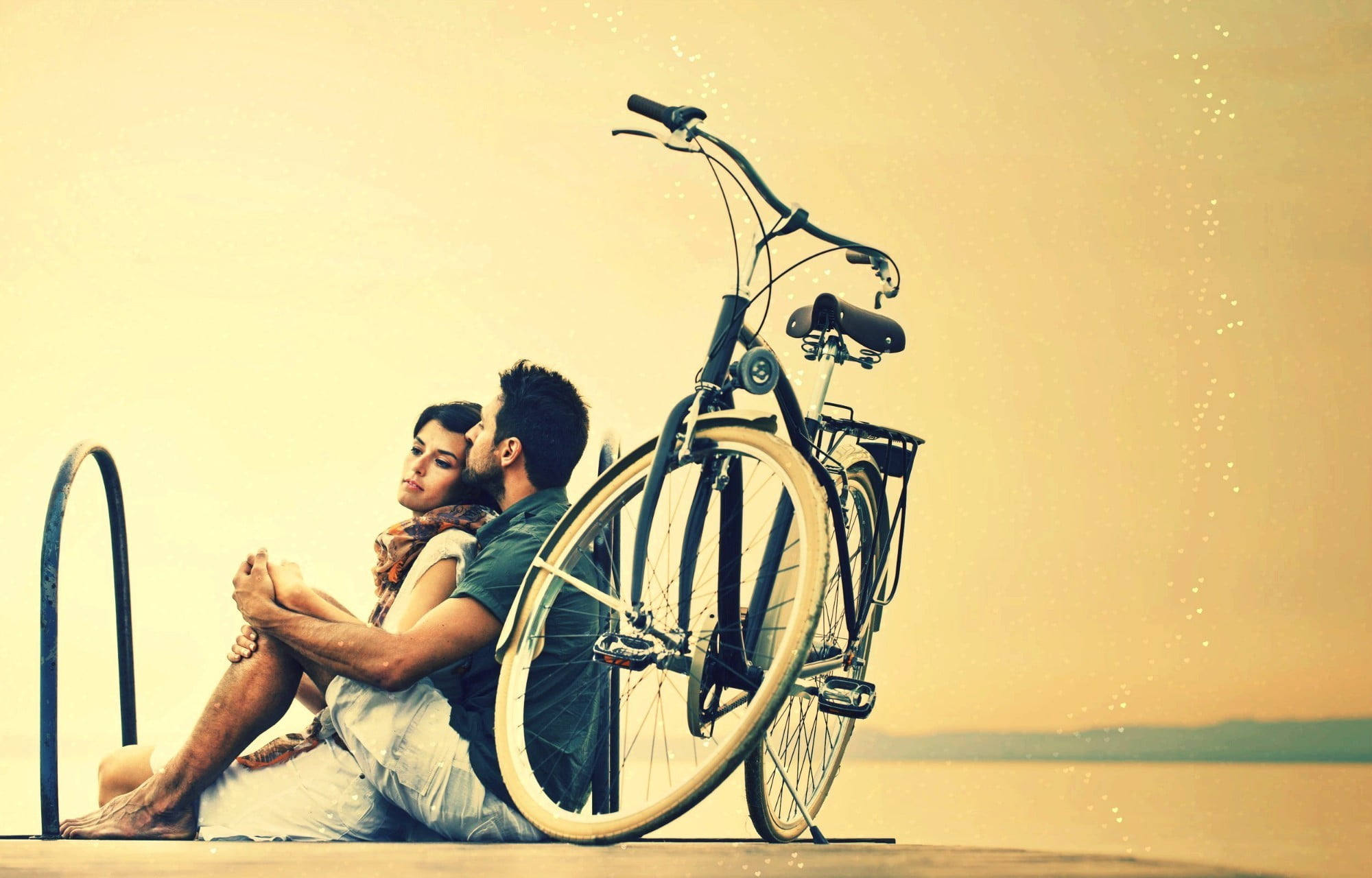 couple women hugging love emotion bicycle two people 2k