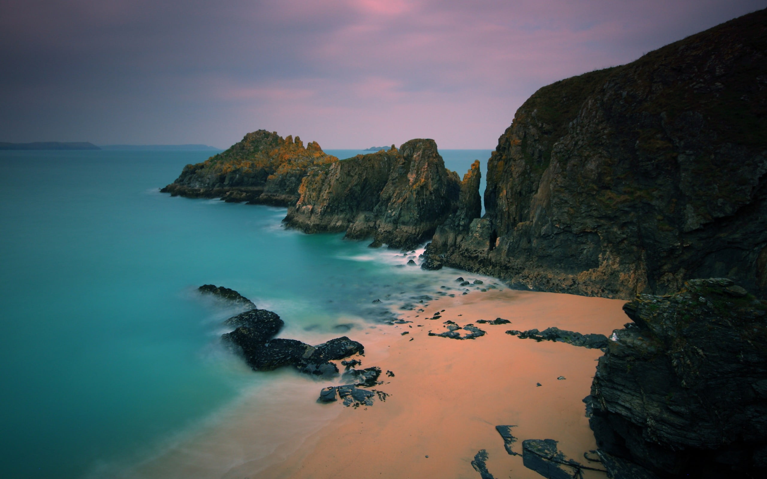 beach and mountain nature sea long exposure water sky beauty in 2k