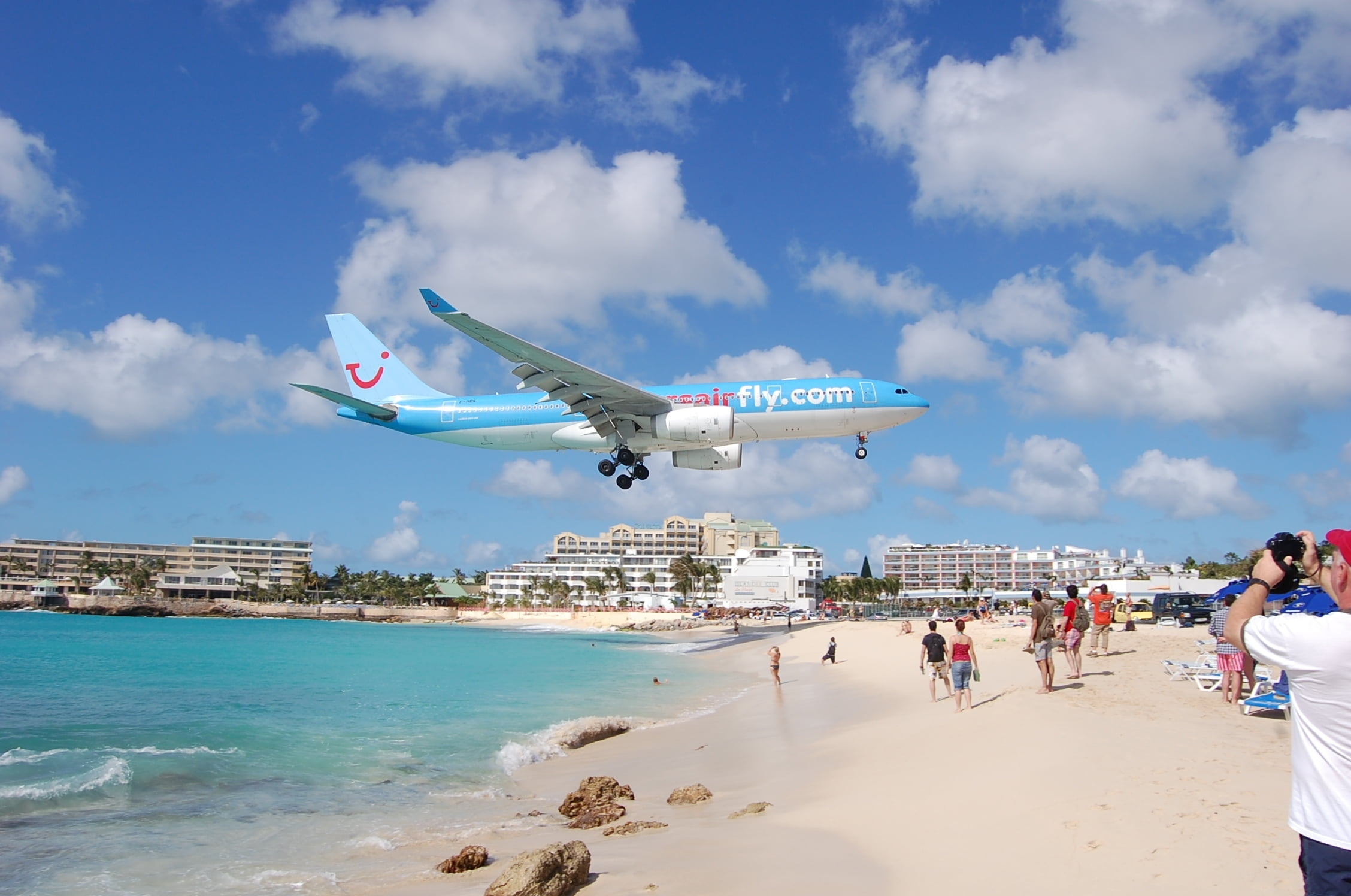 blue and white airplane beach photo the plane Maho Beach 2k