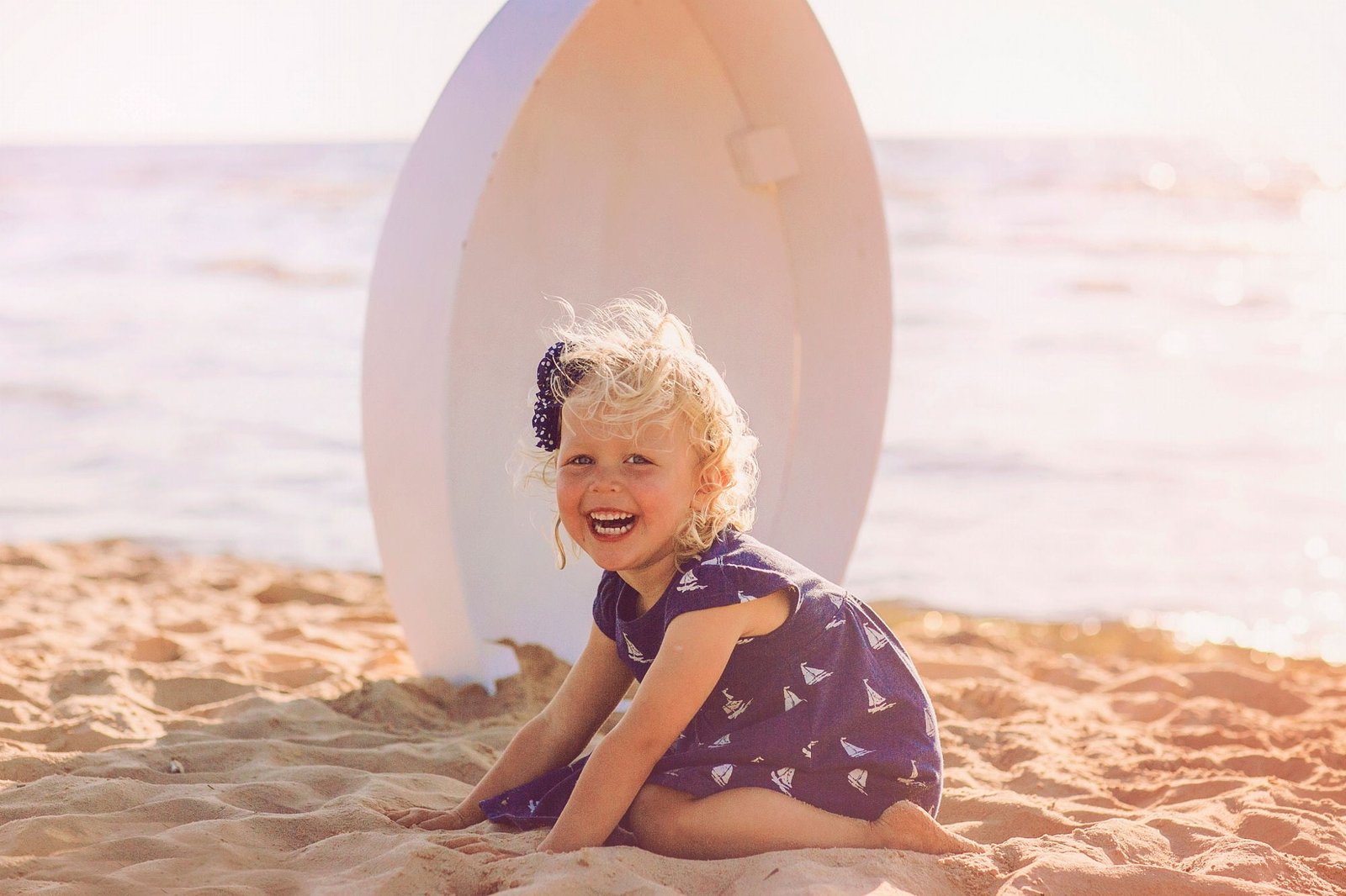 children laughing sand beach childhood land smiling leisure activity 2k